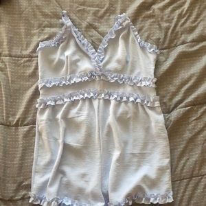 Iris Baby blue romper. Large